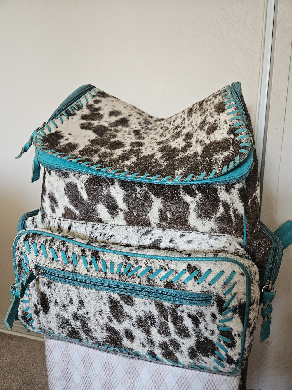 Turquoise-Trim Cowhide Backpack